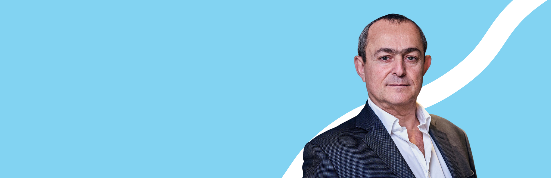 CFO, blue background, man looking