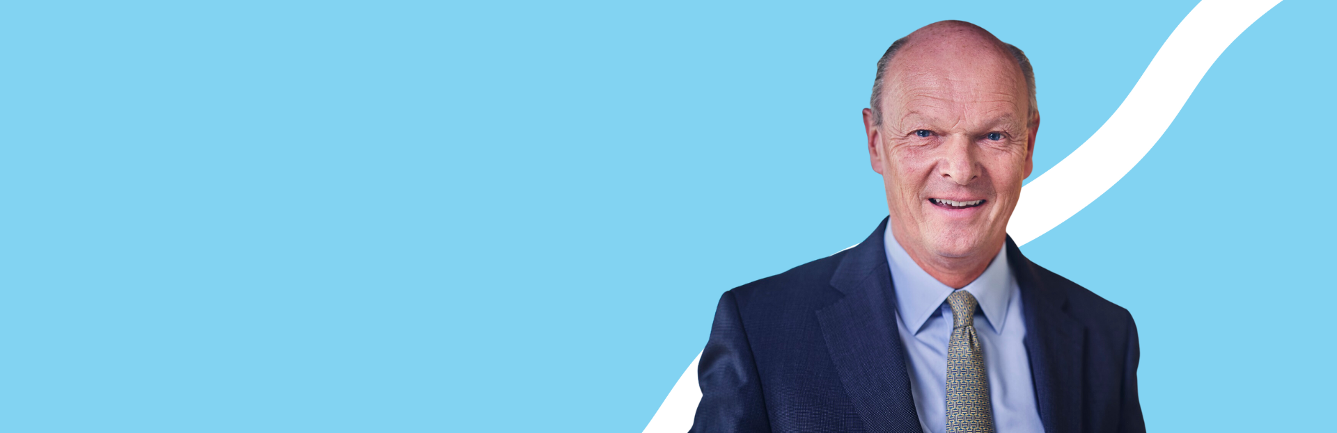 Chair, blue background, man looking