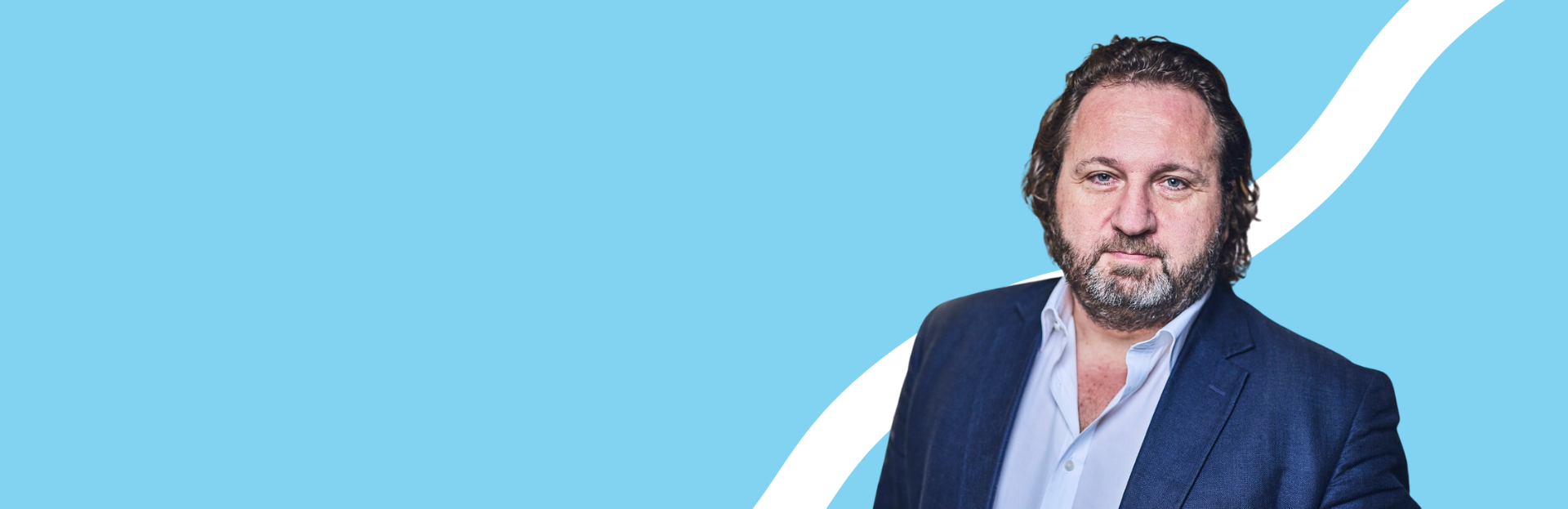 CEO, blue background, man looking